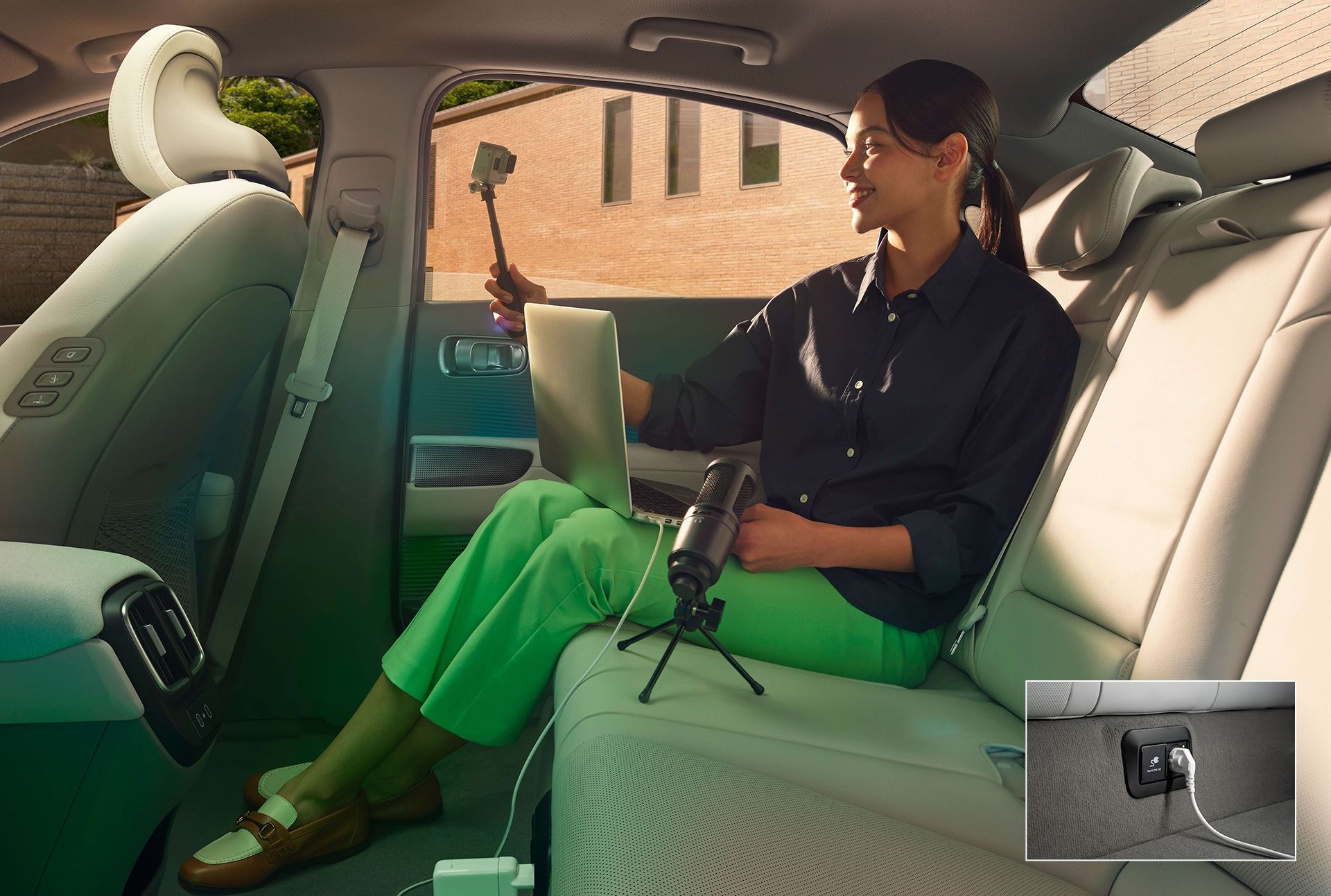 ioniq6 electrically accessible woman taking vlog in ioniq6 pc