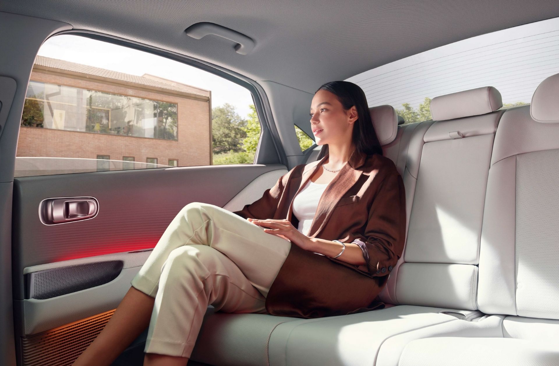 ioniq6 safety keyvisual woman on 2nd row in ioniq6 pc